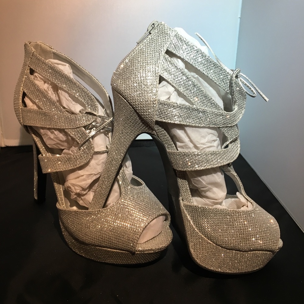 Never worn silver platform shoes